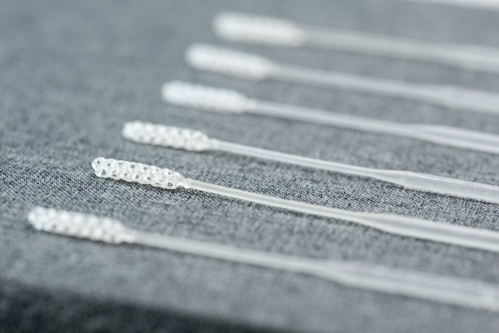 Origin One Swabs on Fabric Surface